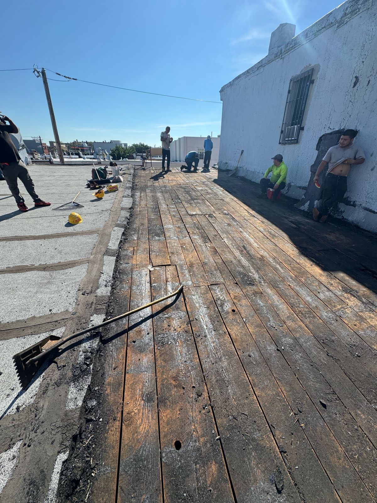 Flat roof tear-off down to the deck