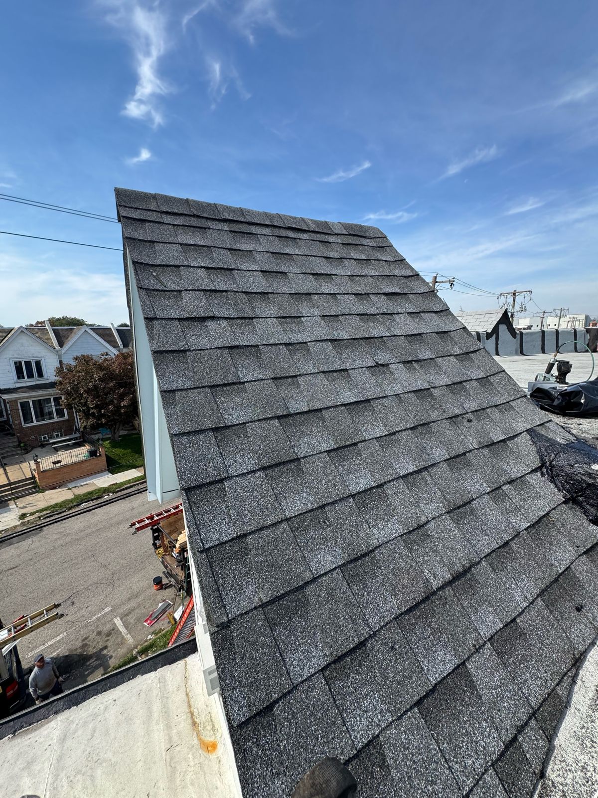 Steep-slope roof: after, new gray shingles
